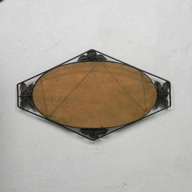 This mirror has a faceted edge. Height: 52 cm. Width: 87 cm. Depth: 6 cm. Faceted mirror dimensions: 34.5 x 67 cm. The...