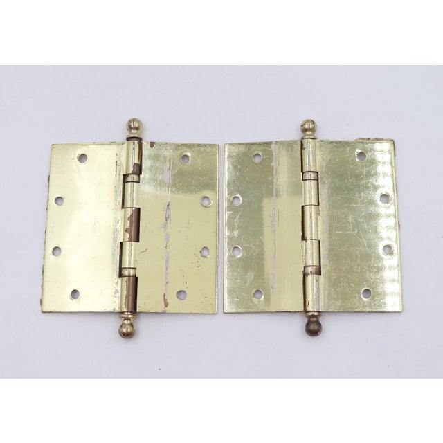 These ball bearing door hinges are made of polished brass with ball tips, five knuckles, and a template hole pattern. Made...