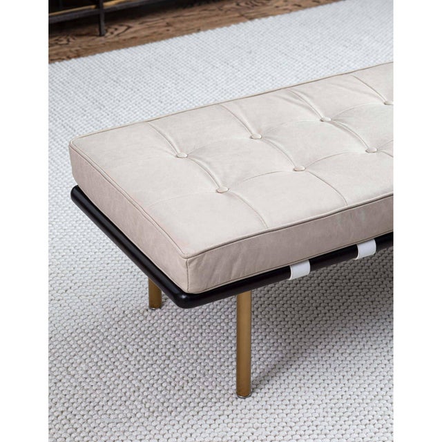 Tufted Gallery bench is wrapped in luscious Cappuccino-colored leather lending a wonderfully comfortable sit. And it...