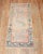 A mid 20th Century small size Turkish rug with a pigeon motif on a peach ground.Professionally Cleaned and able to endure...