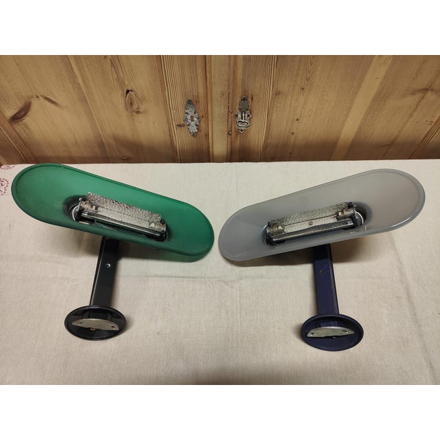 Produced by arteluce, italy, ca. 1970. one-light wall lamp, model 'wall', with an oval-shaped diffuser in etched and...