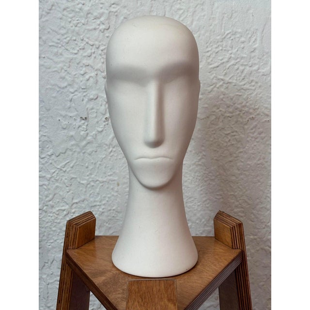 An early 2000s modern white plaster figural head sculpture with a clean matte surface. Suited as a decorative accent on a...