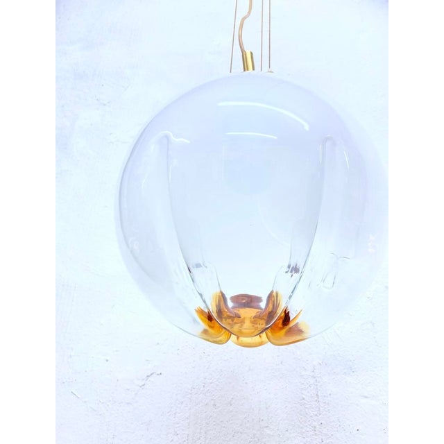 Italian pendant lamp from the 1960s/70s. Glass, metal. Good condition. Minor wear. Patina. 135 x 30 cm Up to 250V...