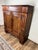 This antique continental pine cupboard, likely German and dating to the early 18th century, is a fine example of early...