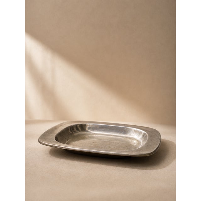 Elegant square solid pewter tray, a work by the celebrated Danish designer Just Andersen 1884 to 1943. This model 2571 is...
