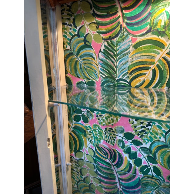 Vintage White Wooden Short Light Up Glass Display Cabinet With Tropical Wallpaper Background For Sale - Image 9 of 11