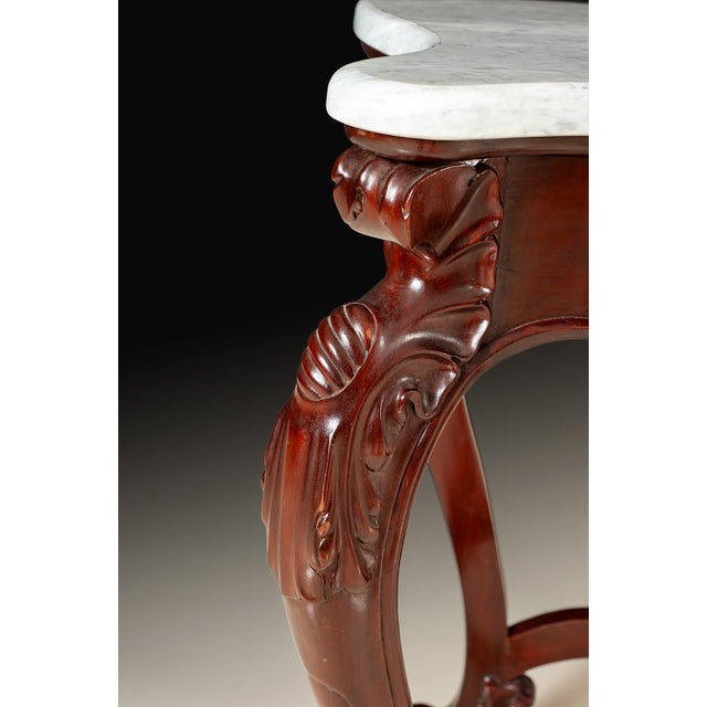 This original Italian antique console table has been completely restored to preserve its remarkable craftsmanship and...