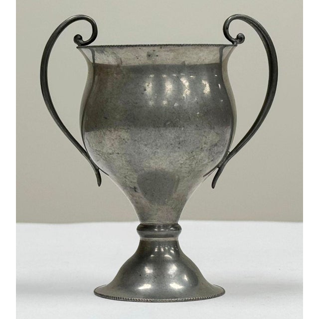 Charming petite vintage pewter trophy vase with exaggerated "handles" and wonderful rope detail to lip. Would be fabulous...