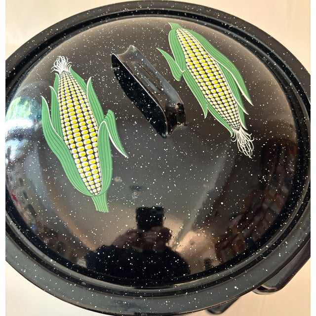 Here is a vintage New England-style enamelware clam steamer pot decorated with some nice, old-school designs. The pot's...