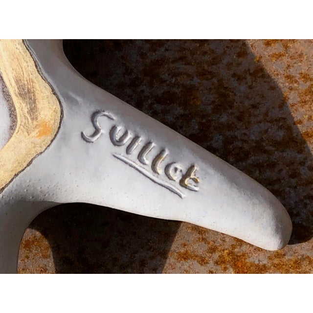 A superb and sculptural ceramic piece, a starfish ashtray or trinket tray, modernist, free-form, in matte white glazed...