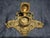 This item is an ornate cast brass inkwell stand crafted in the elaborate Rococo Revival style, typically dating from the...