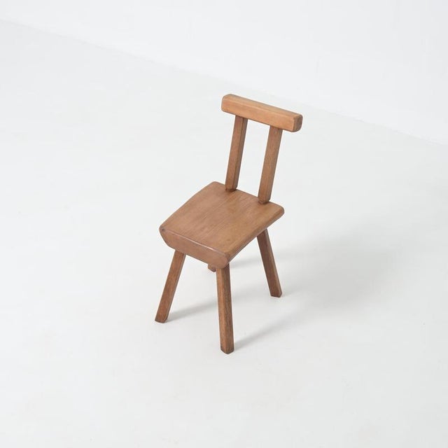 This strong robust chair is handcrafted from dark-colored oak wood. It will bring a natural, bucolic feel to your...
