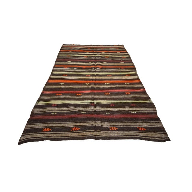 Vintage handwoven decorative kilim rug from Afyon region of Turkey. Approximately 50-60 years old. In very good condition.