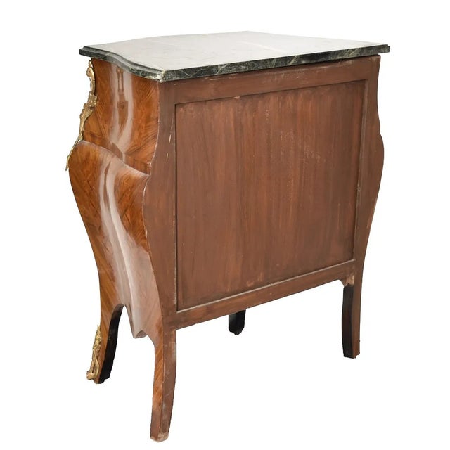 This pair of French Style 3 Drawer Marble Top Night Stands is a beautifully crafted piece of furniture for the bedroom....