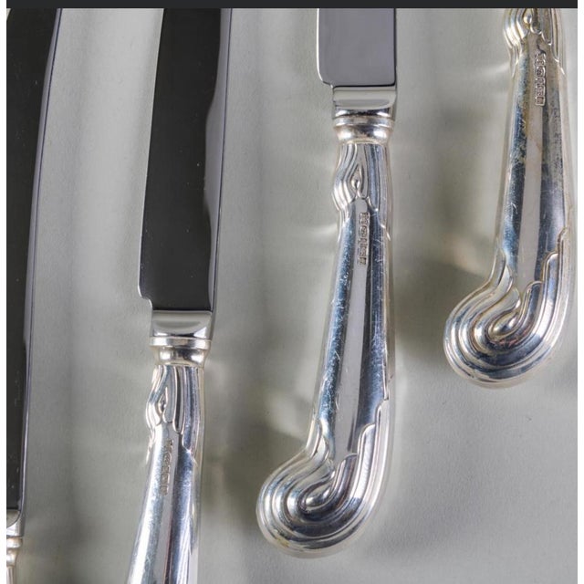 Mark of Terry Shaverin, Sheffield, 2005; with steel blades and filled handles. Together with a similar knife with steel...