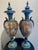 Enhance your interior with this magnificent pair of 19th-century Sèvres-style lidded porcelain urns. Featuring a striking...