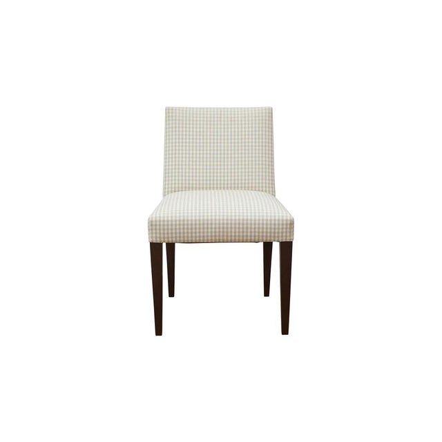 The Kirby chair, shown here, is a MC HOME favorite. Interpreted from a classic 1950s Dunbar design, the chair offers a...