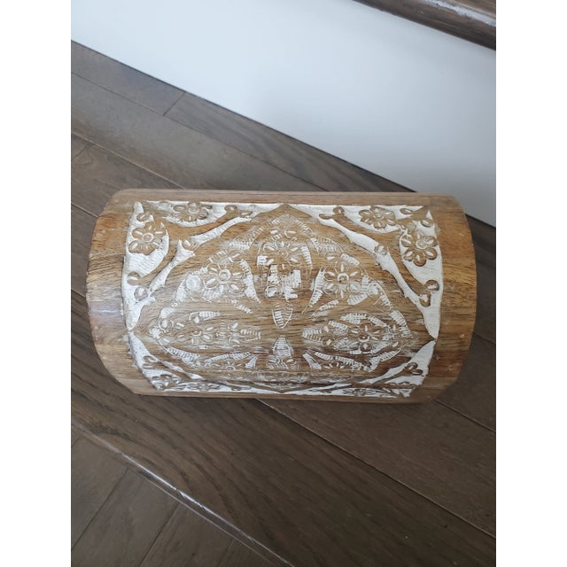 This vintage hand carved mango wood box is decorated with a beautiful floral mandala design and finished with bronze...