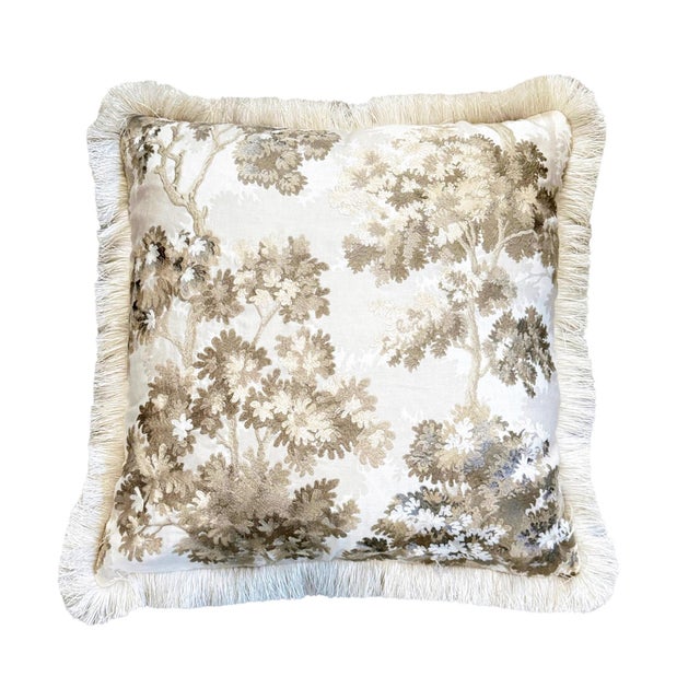Verdure on the light side. This lovely embroidered fabric with it 's leafy towering trees, has a light and airy color...