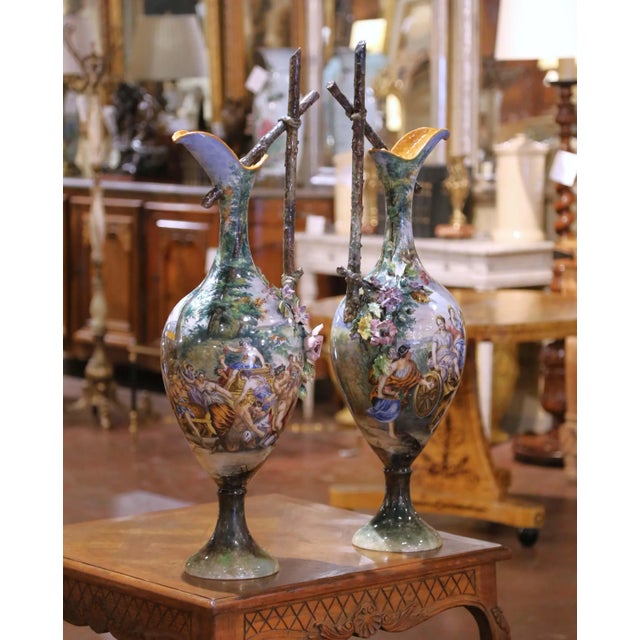 This extraordinary pair of monumental Capodimonte majolica ewers was crafted in Italy circa 1870. Standing over 3 feet...