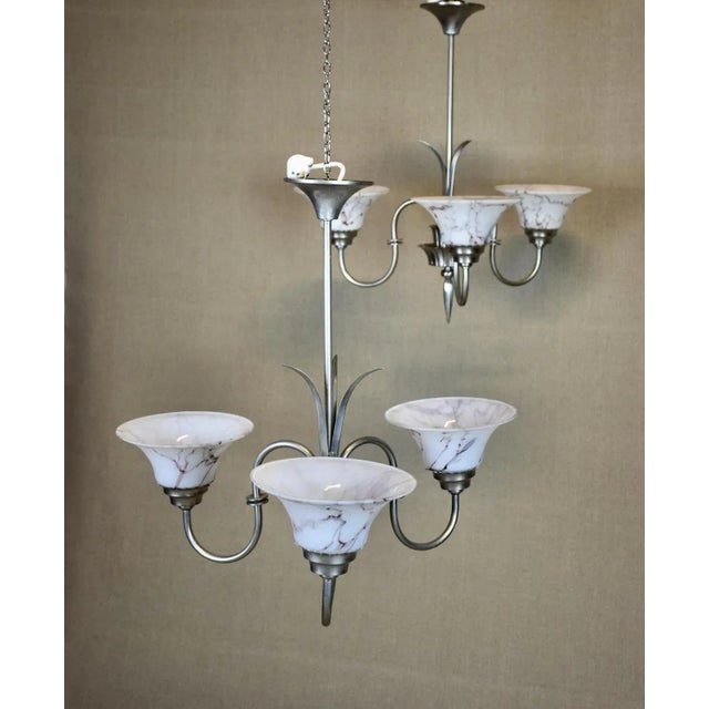 Very rare ceiling lamp from the Swedish Grace period designed by Harald Notini for Böhlmarks. Zinc galvanized on brass...