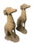 A striking and regal pair of mid-century Neoclassical style seated greyhound (or whippet) garden statues, beautifully...