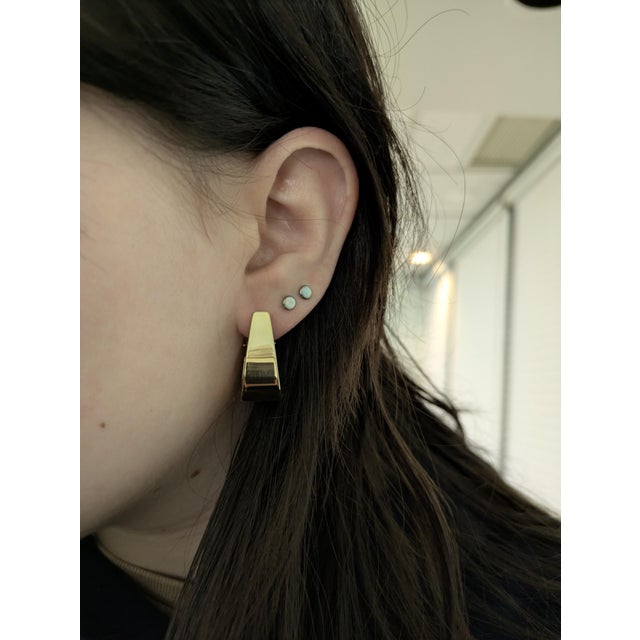 Elegant 14k solid yellow gold hoop earrings, crafted with timeless sophistication and a radiant golden glow. These estate...