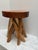 Elegant rustic natural wood carved stool with nine legs interwoven with each other. Elegant decor accent, end table or...