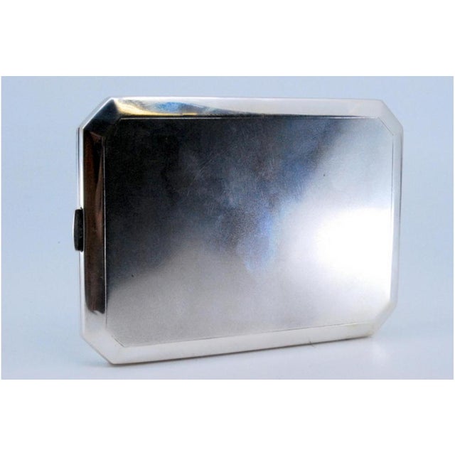 Plain Silver Cigarette Case with Beveled Corners, in Very Good conditions. Designed 1890 to 1919 This piece has an...
