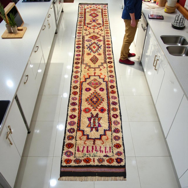 This exceptional extra-long runner, hand-knotted in Southeastern Anatolia during the 1970s, represents a rare find in...