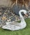 Charming vintage hand-carved wooden swan decoy sculpture with beautiful aged white paint and natural weathering that adds...