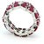 A vibrant vintage eternity-style ring crafted in 18 karat white gold, set with richly colored marquise-cut rubies arranged...