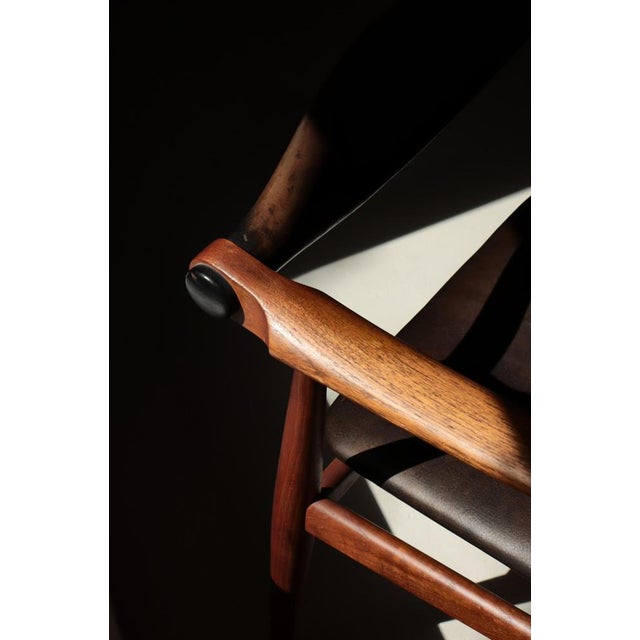 A rare and highly collectible model ch-34 armchair designed by hans j. Wegner in the 1950s, executed in richly figured...