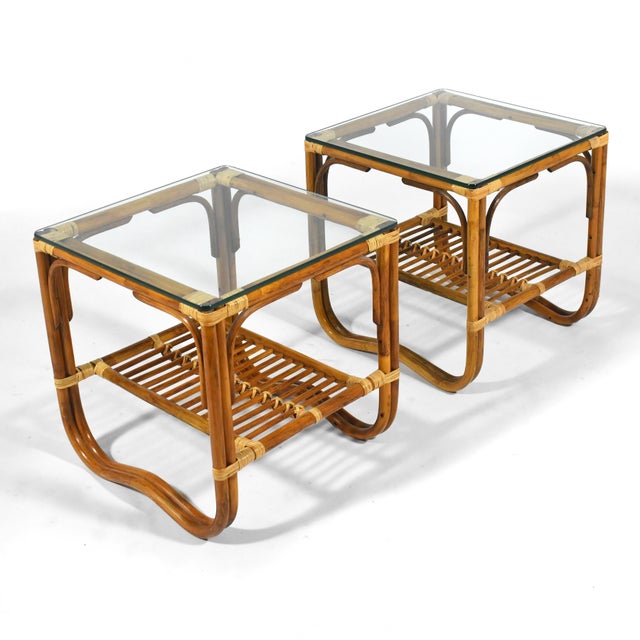 Reminiscent of the refined designs of Elinor and John McGuire, these lovely tables of rattan and cane have glass tops, a...