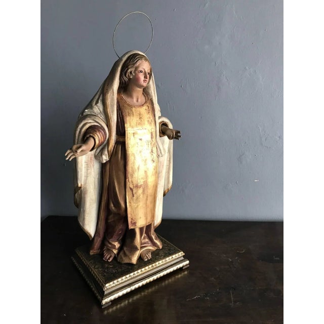 A most spectacular antique Spanish Colonial figure of Madonna, Mexico circa 19th century possibly earlier. Constructed in...