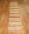 A mid century Turkish Kilim runner from the mid-20th century. Measures: 2'8" x 12'1". Kilims, primarily refer to a type of...