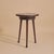 An early 20th century French guéridon table, crafted in dark-stained wood and crowned with a marble top. The circular...