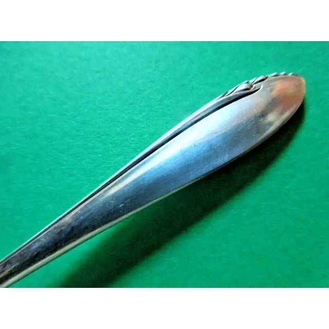 Offered is a wonderful set of 6 cute sterling silver demitasse spoons in Heirloom's 1949 Lasting Spring pattern. Each is 4...