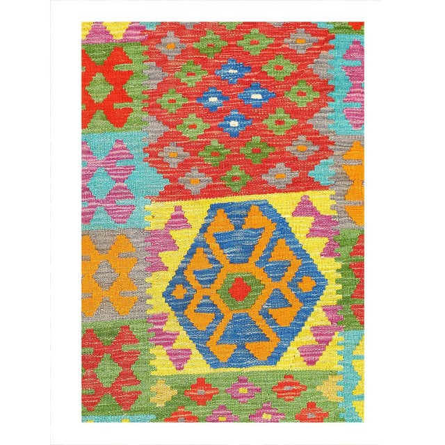 Add a touch of elegance to your home with this casual chic hand woven Kilim wool rug. Constructed on a loom by Nomad...