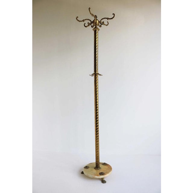 Bring timeless Italian elegance to your interior with this striking Hollywood Regency hall tree, dating from the...