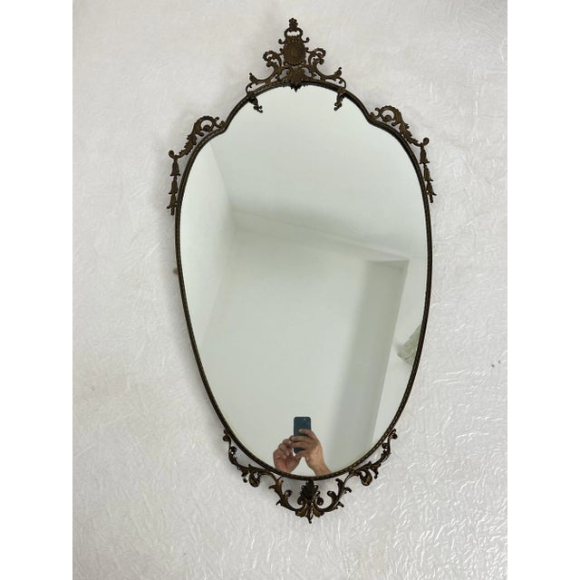 Delightful mid-century brass wall mirror, 1960s Intact and in good condition. Minor signs of wear.