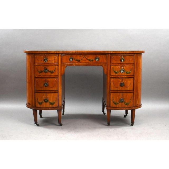 Edwardian Satinwood Kidney Shaped Writing Desk – Circa 1900 An elegant Edwardian satinwood kidney shaped writing desk,...