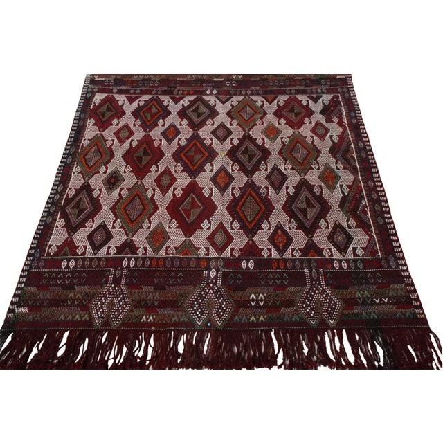 Dexterously woven in wool circa 1950-1960, this 1950s vintage Kilim piece hails from Rug & Kilim’s iconic Kilim & Flat...