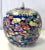 Striking 20th Century Chinese Famille ginger jar. The unique piece is made of porcelain with a blue background, and...