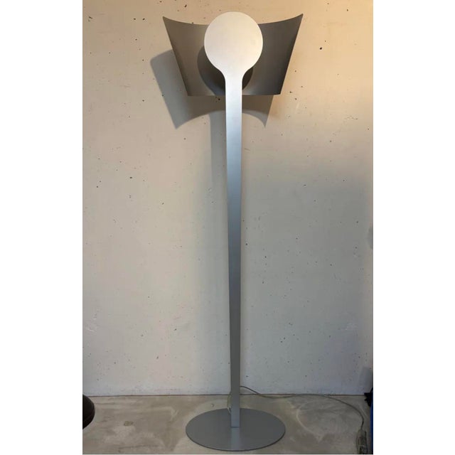 Pallucco floor lamp, circa 2000. Good condition. Note a slight defect on the back of the reflector. This piece has an...