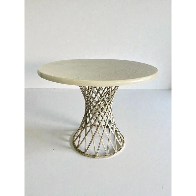 Striking vintage 1970s sculptural pedestal dining table crafted in molded fiberglass with internal metal structure....