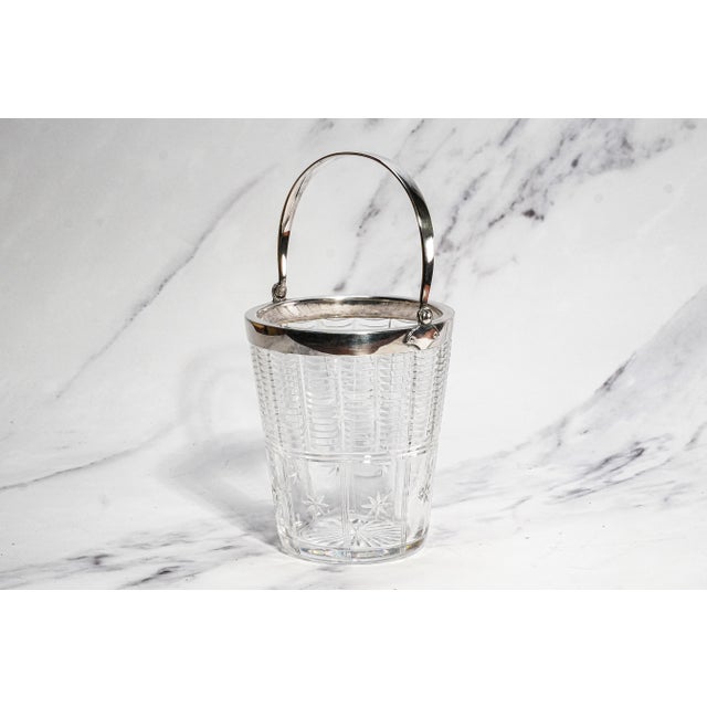 A refined accent for the well-appointed bar, this vintage English crystal ice bucket embodies timeless elegance and...