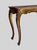 Vintage Italian Louis XV Style Giltwood Console, serpentine-form top over cabriole legs with distressed gilt wood finish....