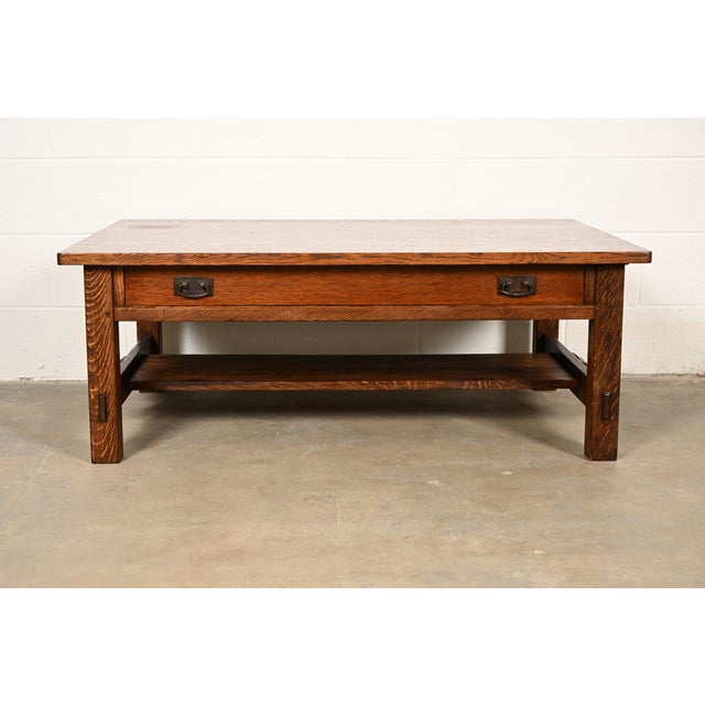 An exceptional antique Mission or Arts & Crafts period two-tier coffee table with drawer By L. & J.G. Stickley USA, Circa...