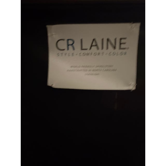 Leather chair by CR Laine, Thayer model L4000-05, featuring a tight back, tight seat, and low profile arm. Constructed...